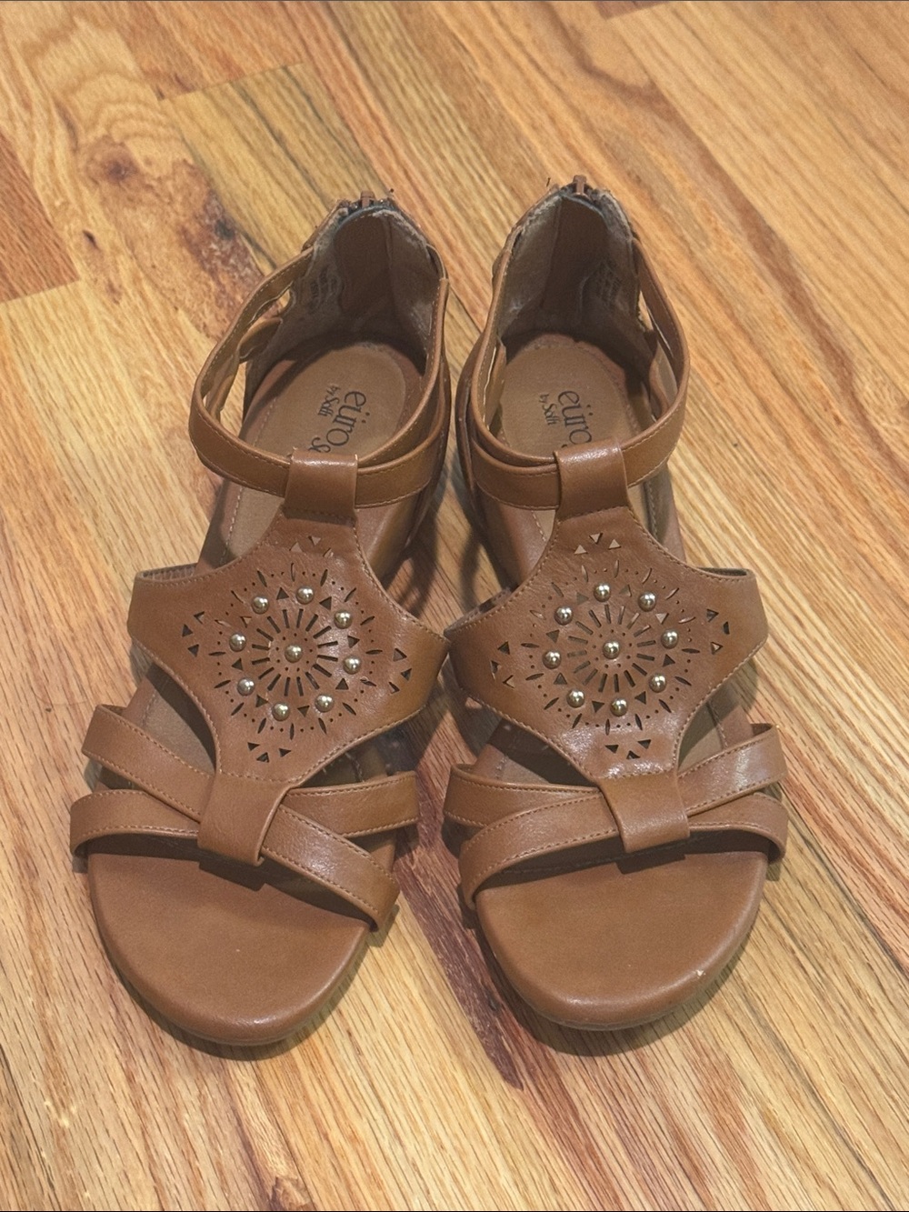 Eurosport size 6.5 sandals with laser cutouts and stud embellishments size
